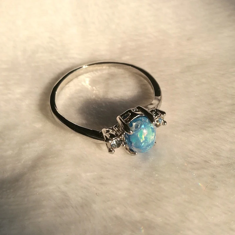 Oval Cut Fire Opal Ring - Image 4